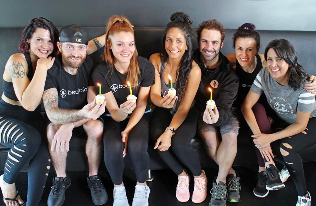 Beatbike team celebrating with cupcakes